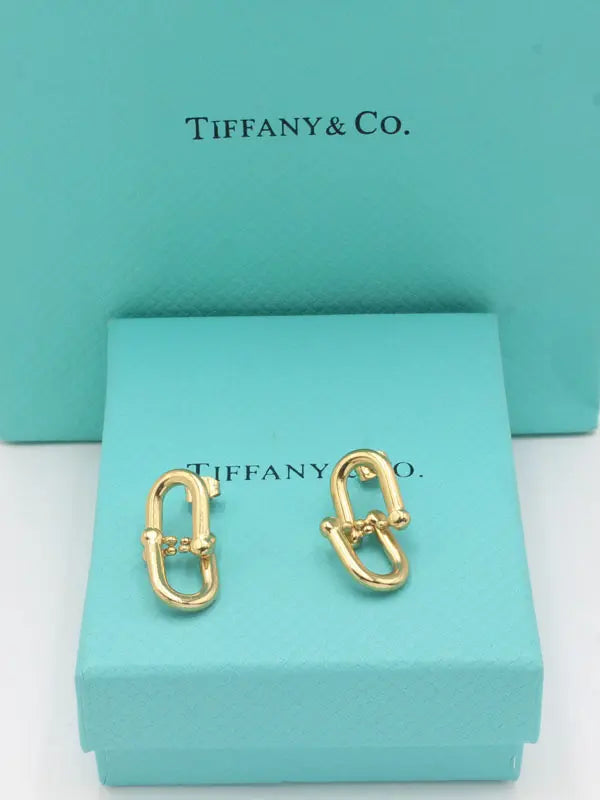 حلق تيفاني ميتال قولد حلق tiffany ذهبي