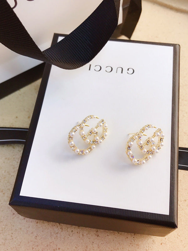 حلق قوتشي لوقو ذهبي لولو حلق gucci