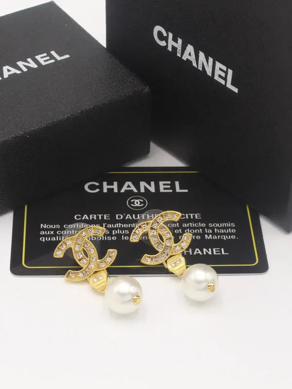 حلق شانيل مطفي قولد 651 حلق chanel ذهبي