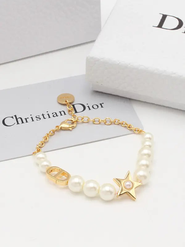 اساور ديور ستار لوقو بيرل اسواره dior ذهبي