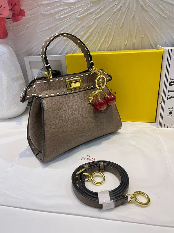 شنطة فندي بنية بتعليقه كرز شنط وحقائب fendi bags بني