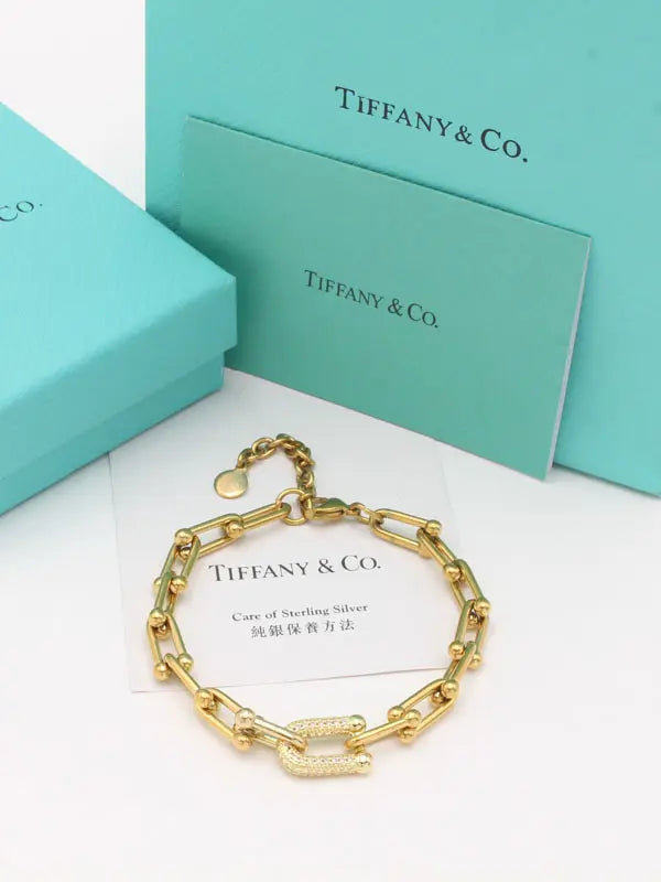 اسوارة تيفاني ميتال اند ستونز اسواره tiffany ذهبي