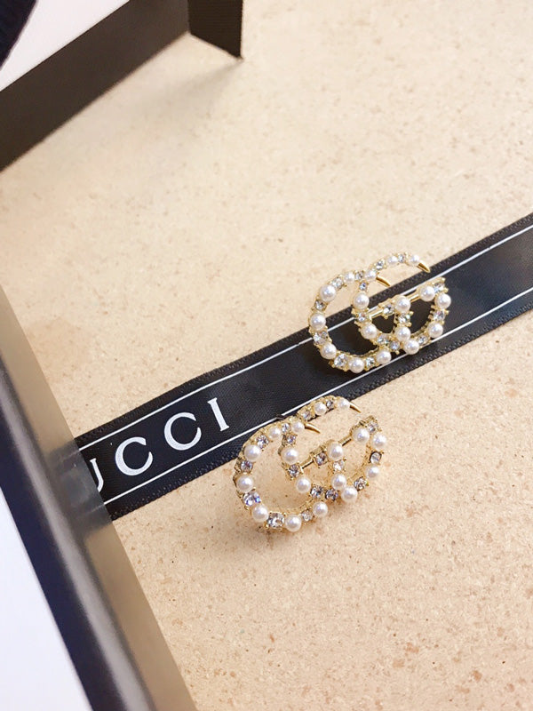 حلق قوتشي لوقو ذهبي لولو حلق gucci