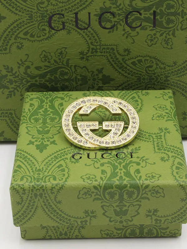 بروش قوتشي كرستال بروش gucci ذهبي