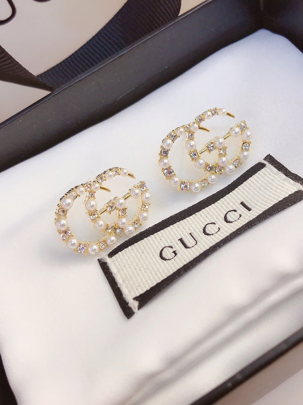 حلق قوتشي لوقو ذهبي لولو حلق gucci ذهبي