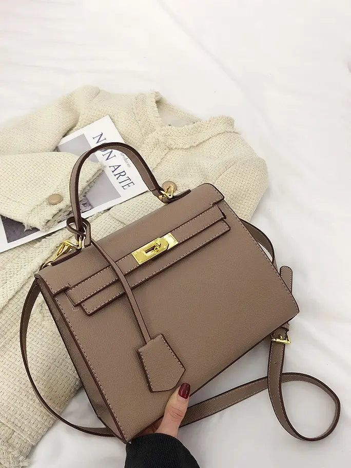 حقيبة نسائية انيقة اسود بحزام قفل شنط وحقائب شنط كاكي