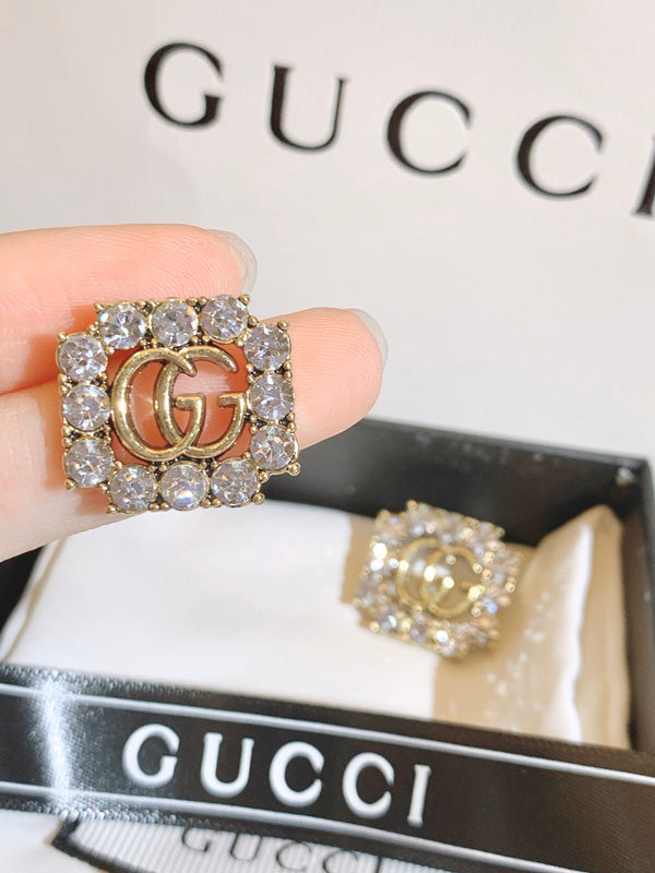 حلق قوتشي لوقو انتيك حلق gucci برونز فضي