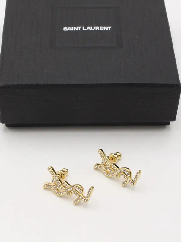 حلق ايف سان لوران كريستال لوقو حلق ysl