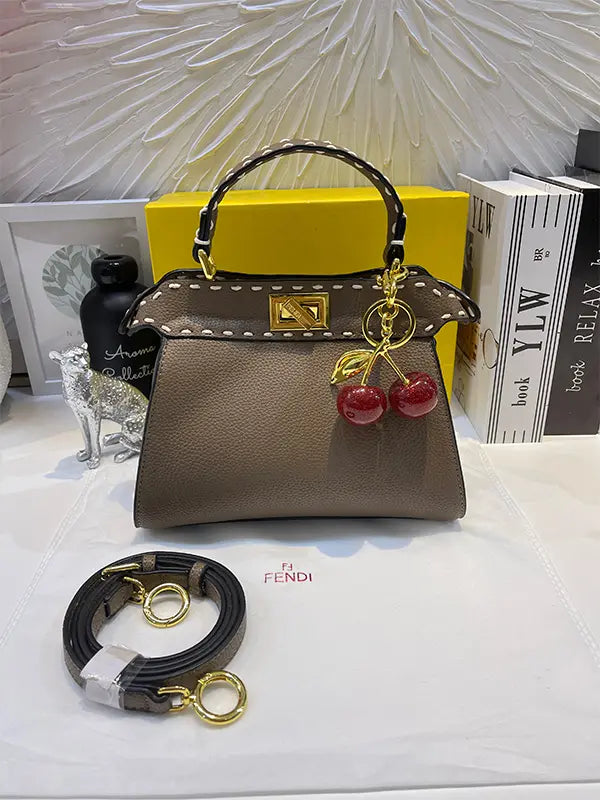 شنطة فندي بنية بتعليقه كرز شنط وحقائب fendi bags