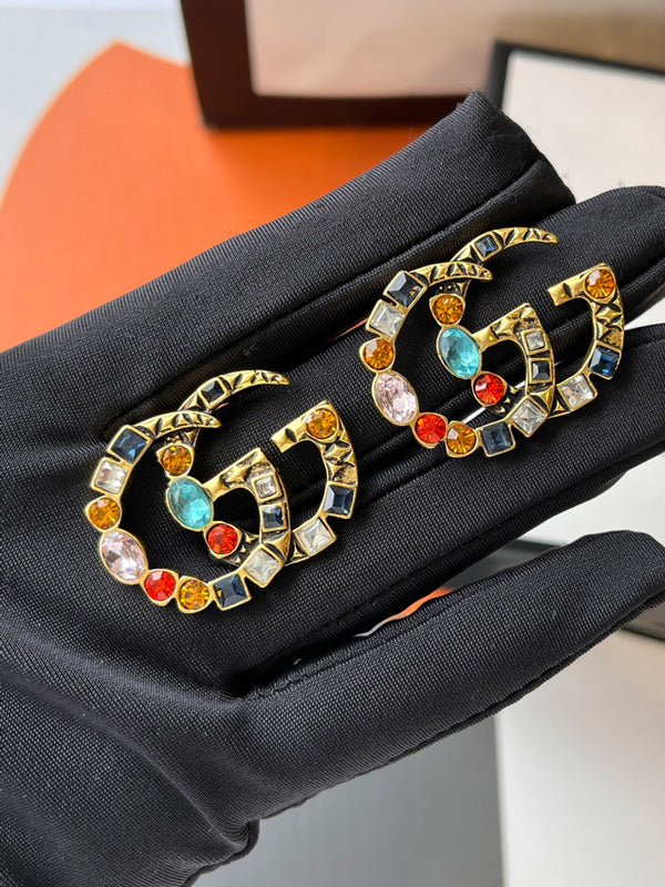 حلق قوتشي لوقو انتيك ملون حلق gucci ملون