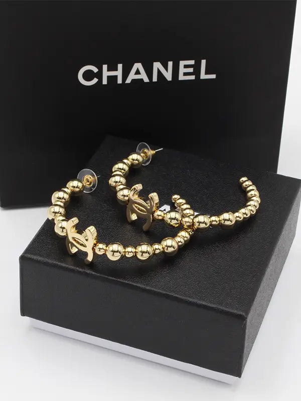 حلق شانيل كبير ميتال ذهبي لوقو حلق chanel