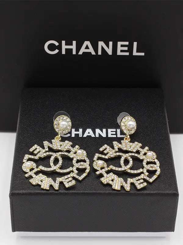 حلق شانيل كبير لولو وكريستال لوقو حلق chanel ذهبي