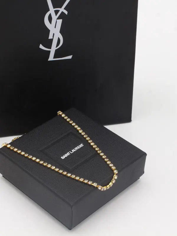 تشوكر ايف سان لوران عقد كريستال لوقو سلسال ysl