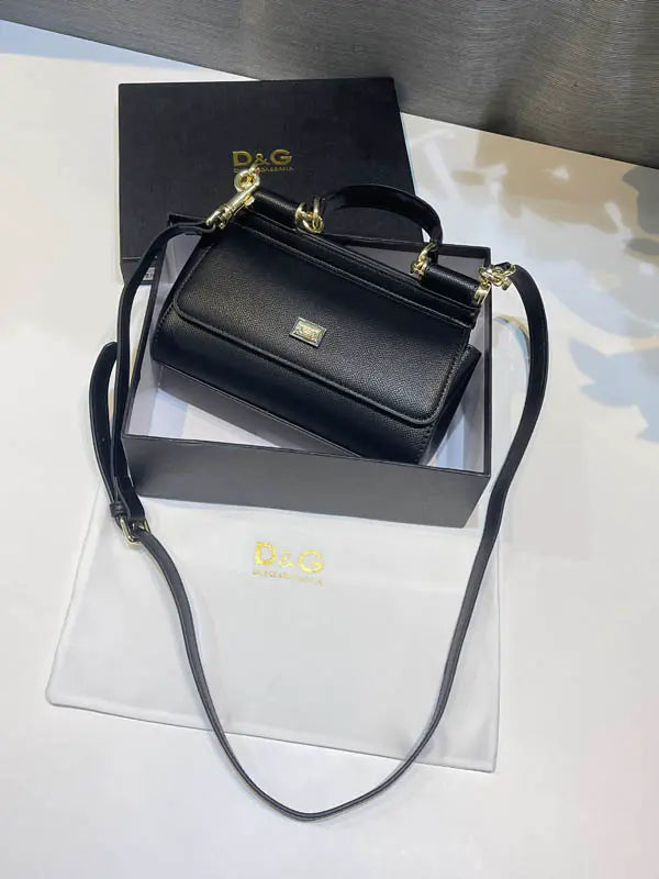 شنطة دولتشي قبانا اسود جلد ماستر شنط وحقائب tory burch