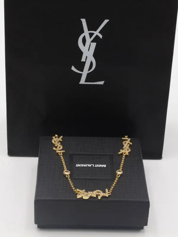 سلسال ايف سان لوران زركون لوقو سلسال ysl