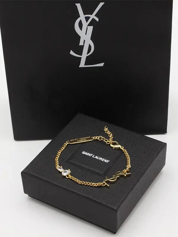 اسوارة ايف سان لوران زركون لوقو اسواره ysl فضي