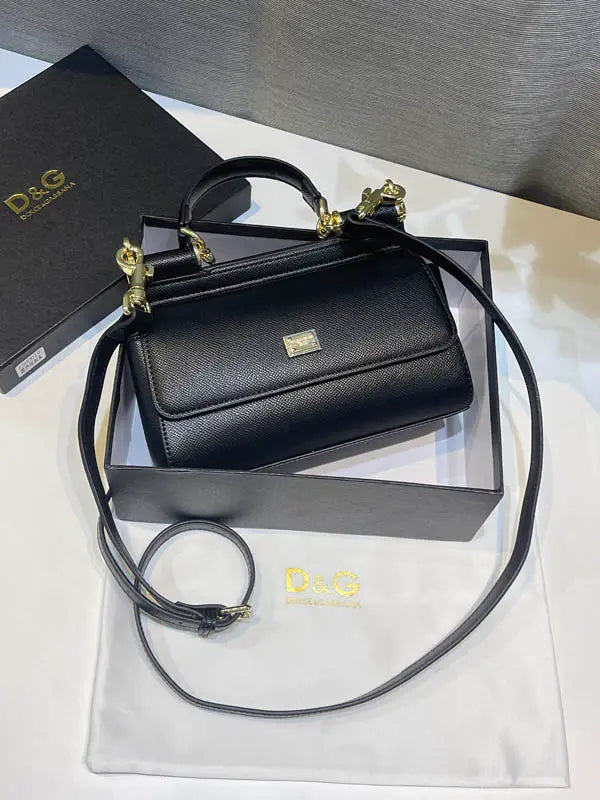 شنطة دولتشي قبانا اسود جلد ماستر شنط وحقائب tory burch