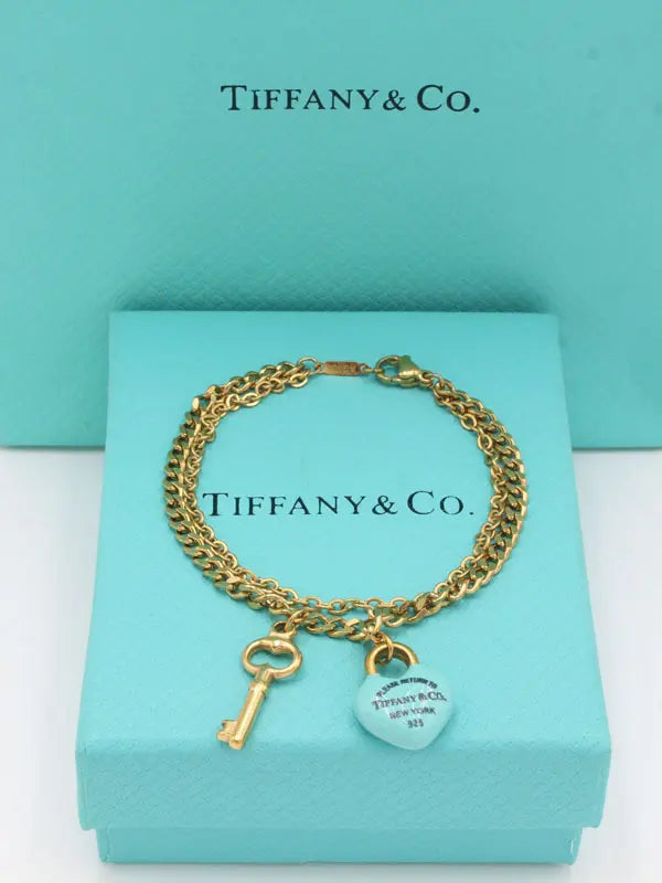 اسوارة تيفاني ميتال بلو هارت اند كي اسواره tiffany ذهبي