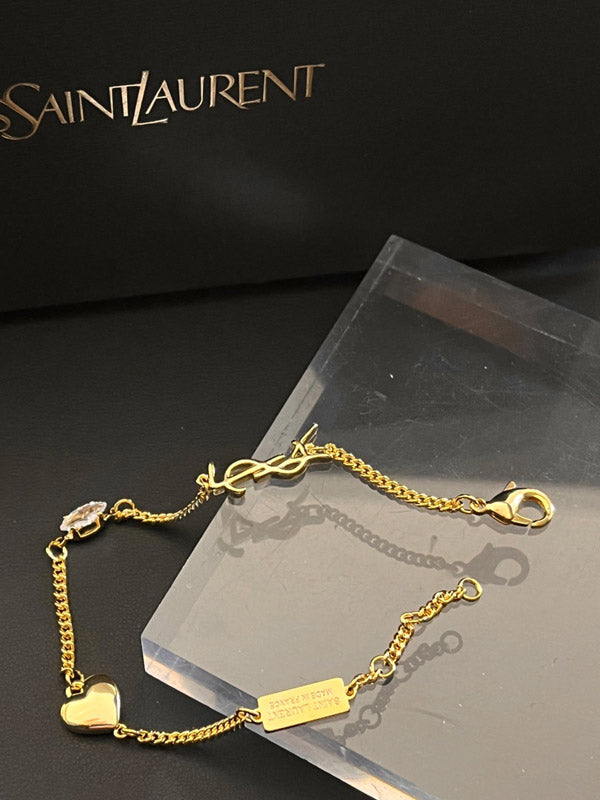 اسوارة ايف سان لوران ذهبي اسواره ysl