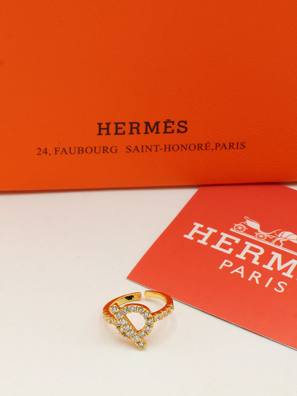 خاتم هيرمز زركون لوقو خواتم tory burch ذهبي