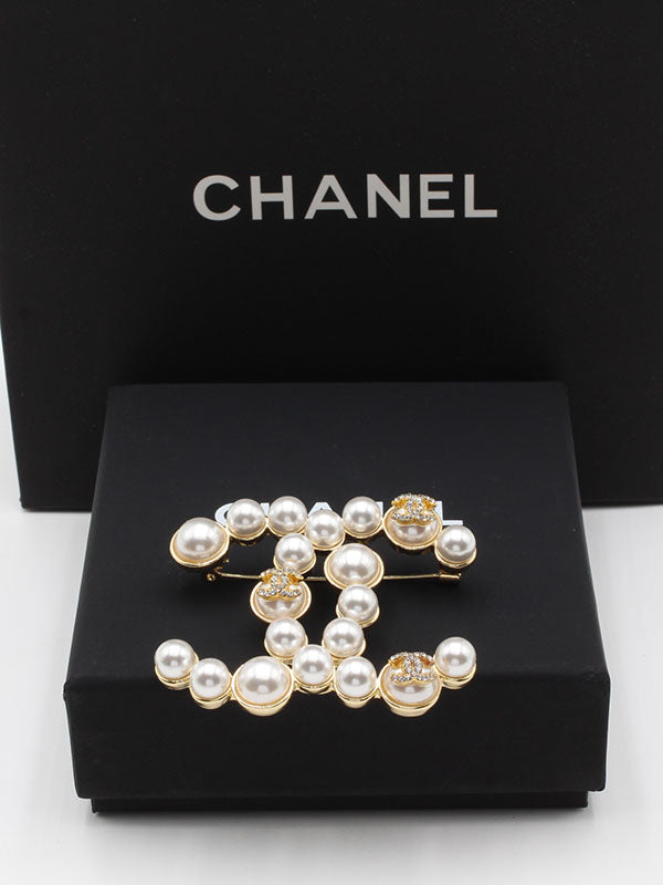 بروش شانيل بيرل بيق ذهبي بروش chanel ذهبي