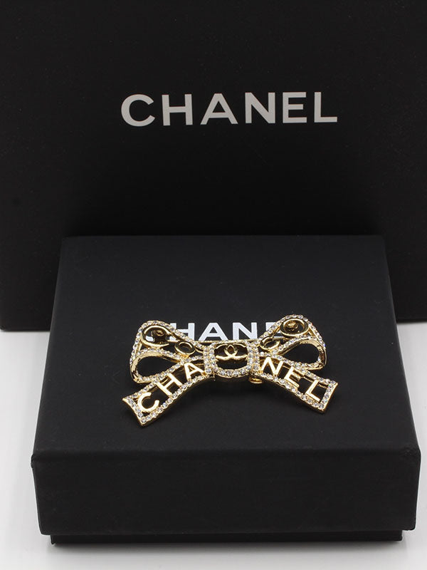 بروش شانيل فيونكة بروش chanel ذهبي