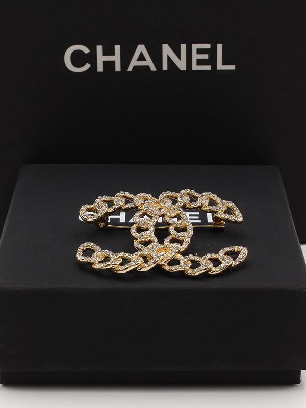 بروش شانيل جنزير كريستال بروش chanel