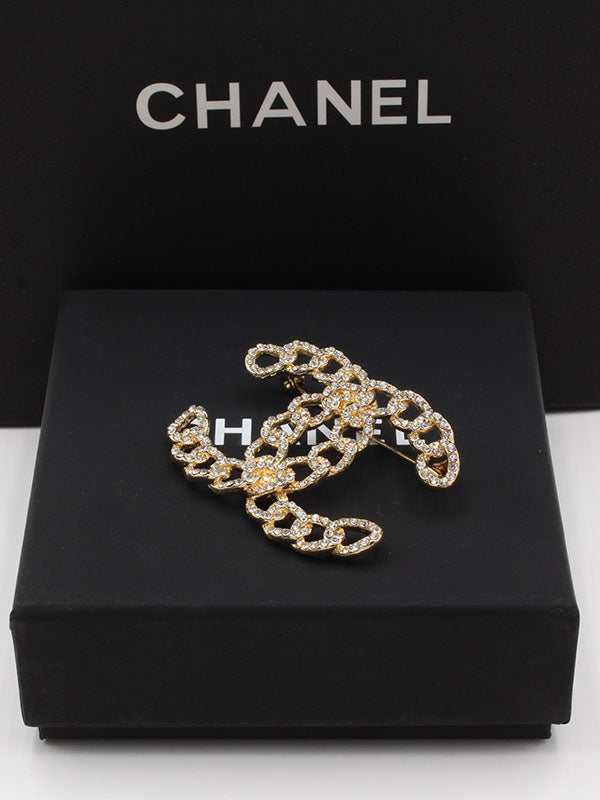 بروش شانيل جنزير كريستال بروش chanel