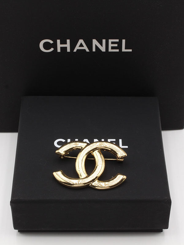 بروش شانيل ميتال ذهبي بروش chanel