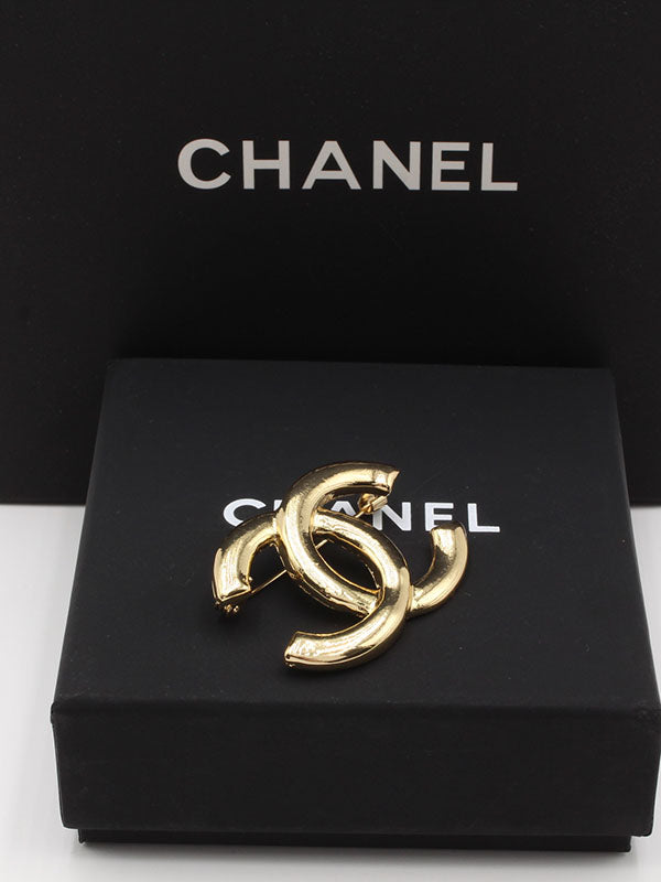 بروش شانيل ميتال ذهبي بروش chanel