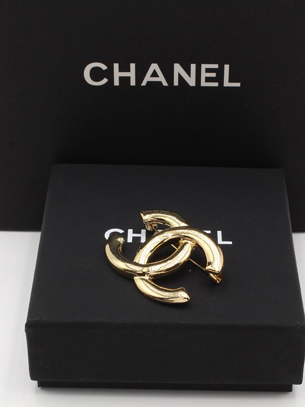 بروش شانيل ميتال ذهبي بروش chanel
