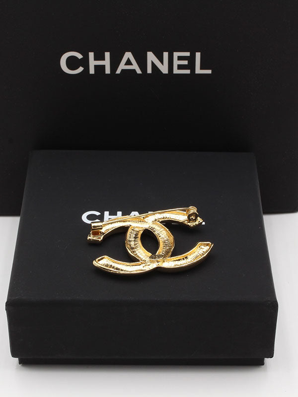 بروش شانيل ميتال ذهبي بروش chanel