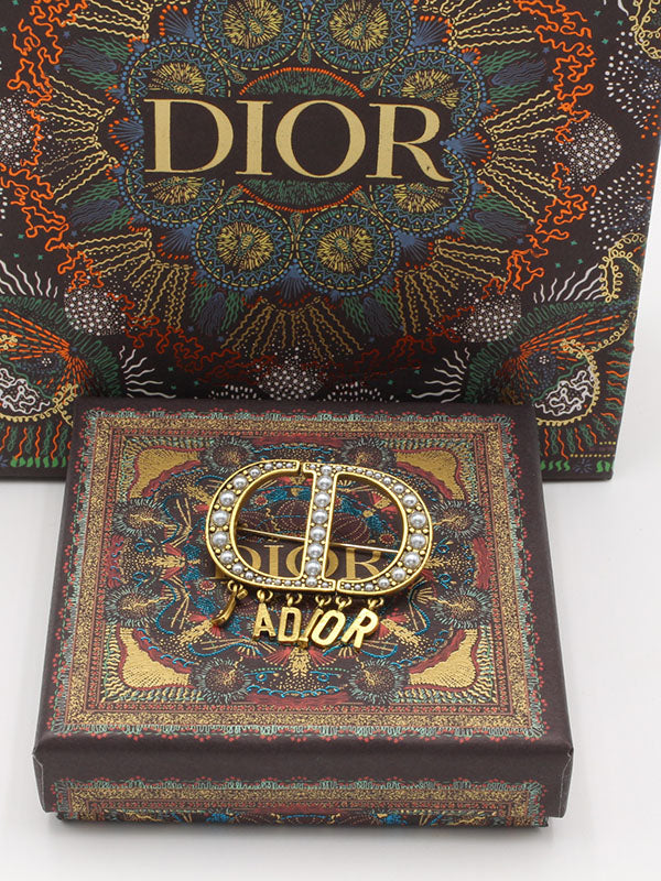بروش ديور لولو برونز بروش dior ذهبي