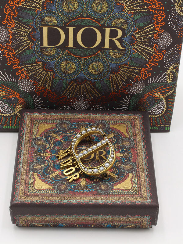 بروش ديور لولو برونز بروش dior