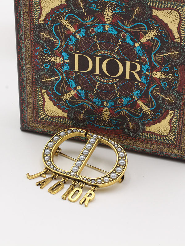 بروش ديور لولو برونز بروش dior