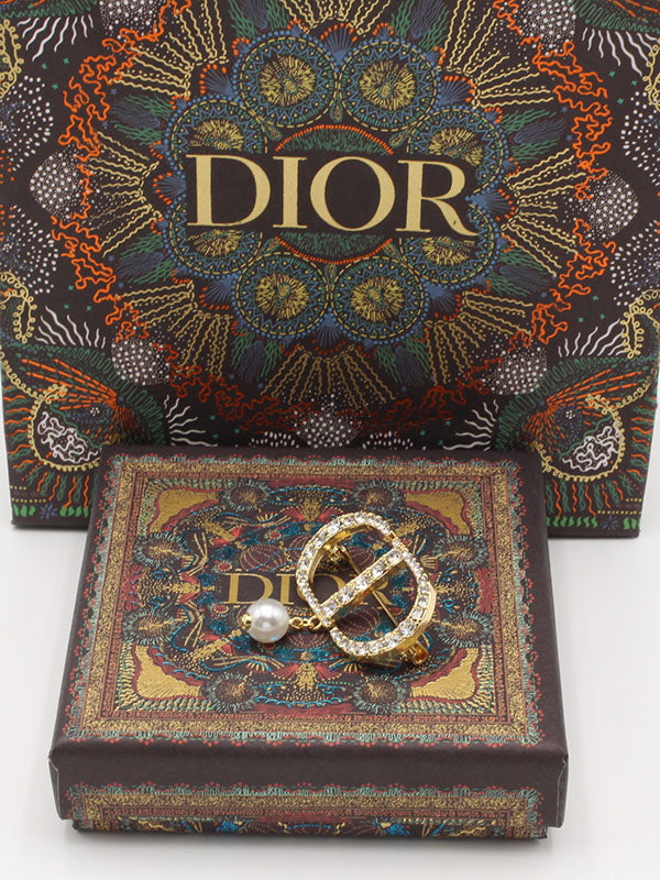 بروش ديور لول ذهبي بروش dior