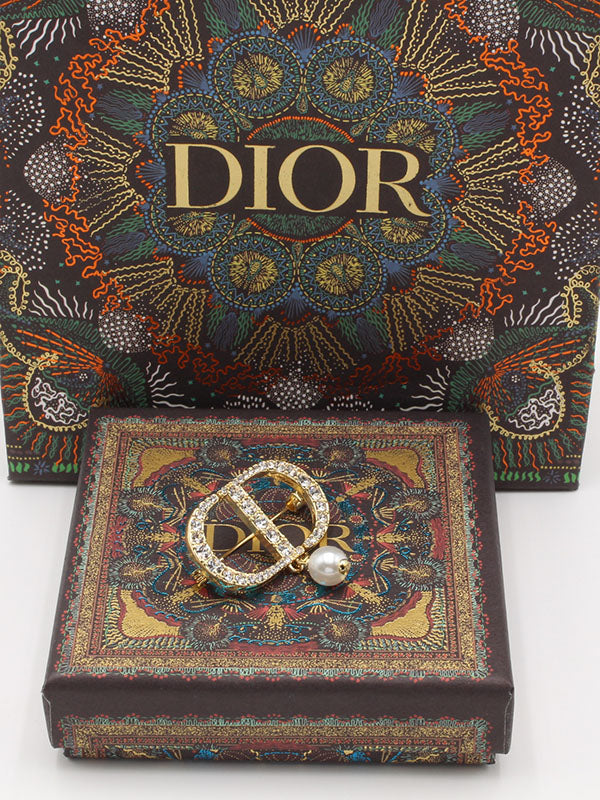 بروش ديور لول ذهبي بروش dior