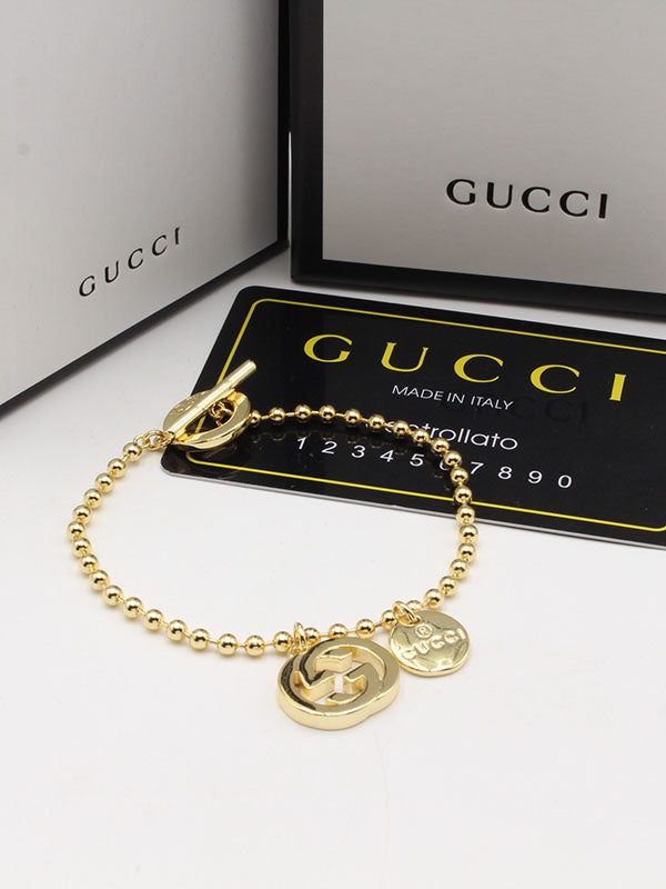 اساور قوتشي بولز شاين لوقو اسواره gucci ذهبي