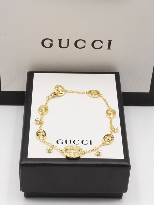 اساور قوتشي مكس بدنتس صغير لوقو اسواره gucci ذهبي