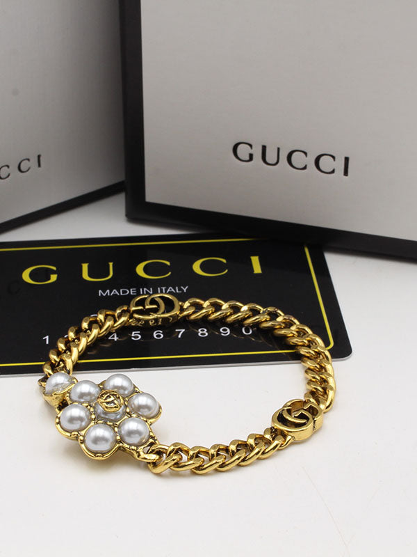 اساور قوتشي لولو وردة لوقو اسواره gucci برونزي