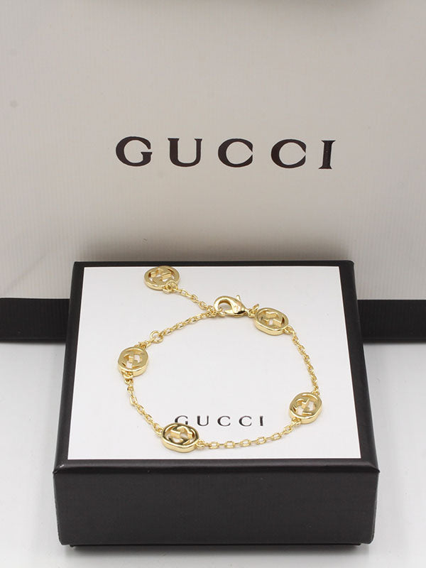 اساور قوتشي سمبل شاين لوقو اسواره gucci ذهبي