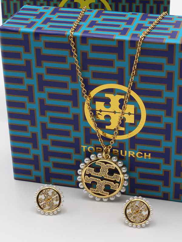 طقم توري بورش مدور لولو لوقو اطقم tory burch ذهبي