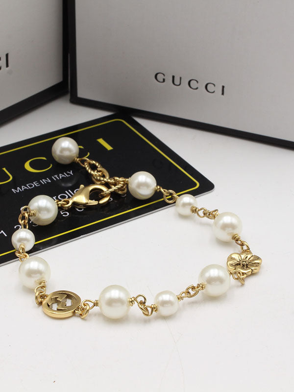 اساور قوتشي بيرل لوقو برونز اسواره gucci ذهبي