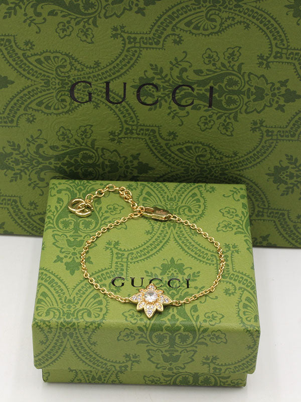 اساور قوتشي ون فلاور زركون لوقو اسواره gucci ذهبي