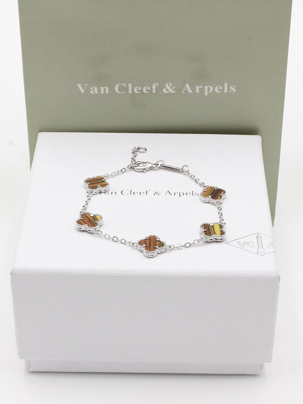 اساور فان كليف لوقو وسط اسواره van cleef بني فضي