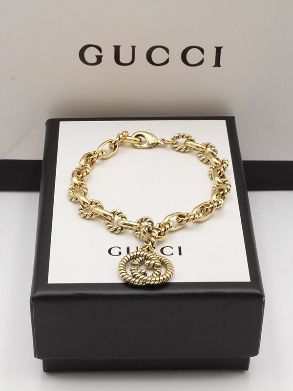 اساور قوتشي بيق بنتدنت لوقو برونز اسواره gucci ذهبي