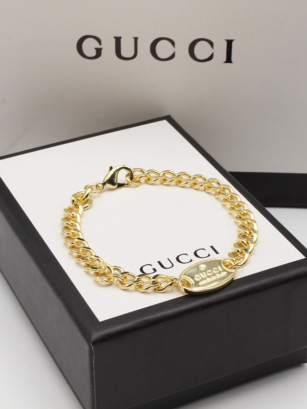 اساور قوتشي بيضاوي لوقو اسواره gucci ذهبي