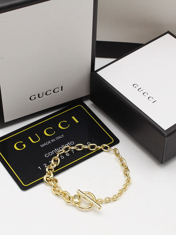 اساور قوتشي سمبل جنزير لوقو اسواره gucci ذهبي
