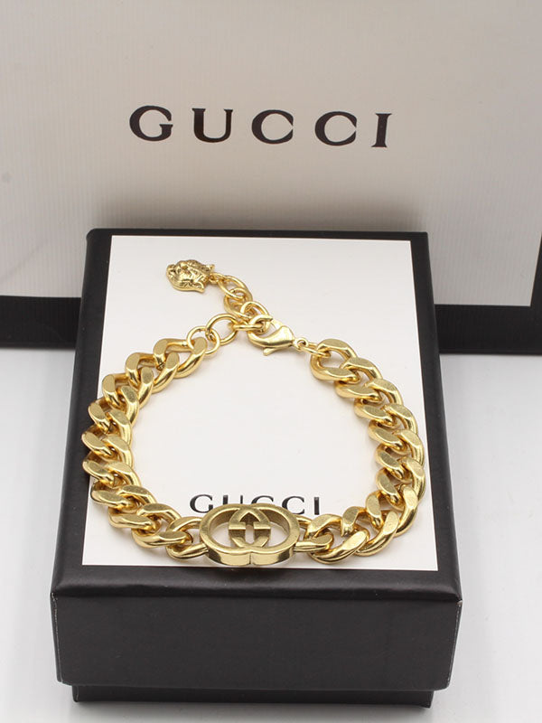 اساور قوتشي جنزير كبير لوقو اسواره gucci ذهبي