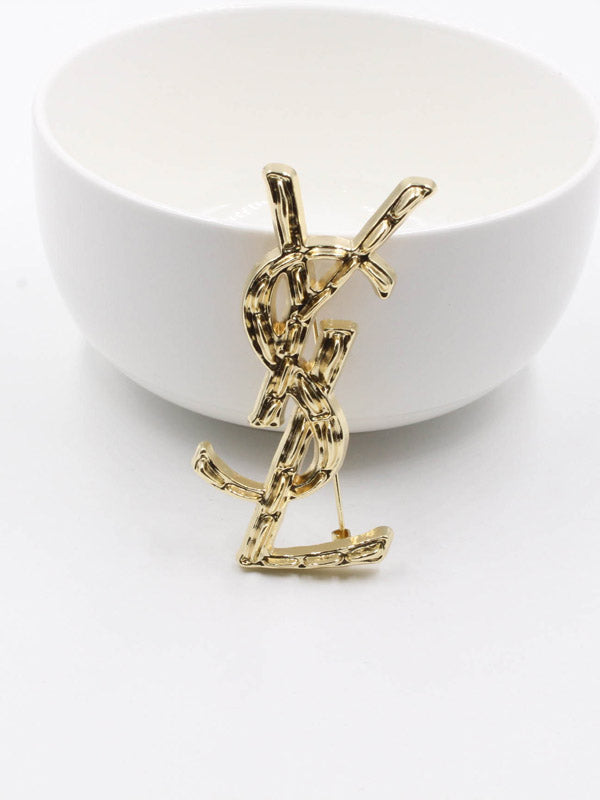 بروش ماركة ايف سان لوران كبير بروش ysl